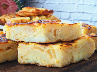 Close-up of Spanish omelette with potatoes, apples and onion