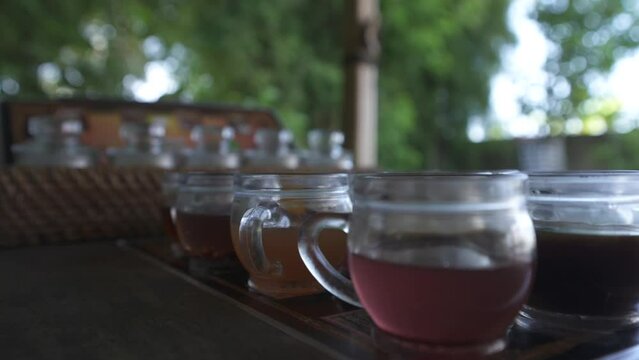 Coffee varieties in sample cups at Teba Sari coffee House near Lodtunduh, Ubud, Ubud, Bali, Indonesia, South East Asia