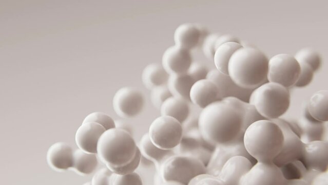 Abstract 3D render animation slow motion moving milky white milk orbs matte animated background metaballs blobs particles bubbles morphing flying molecules wallpaper medical presentation backdrop