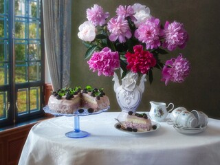 Still life with bouquet of peonies and cake