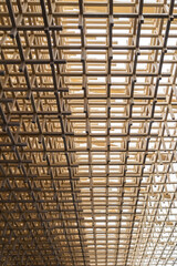 Close-up view of the wooden roof frame for building construction..