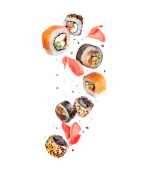 Various sushi rolls with ginger in the air on a white background