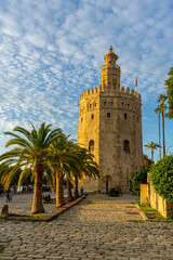 Fototapeta na wymiar Gold tower on sunset (Torre del Oro) in Sevilla, Spain on January 1, 2023