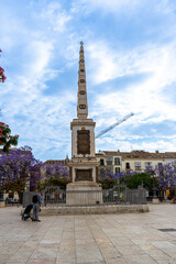 Fototapeta na wymiar Monumento a Torrijos on Merced square (Plaza de la Merced) in Malaga, Spain on May 20, 2023
