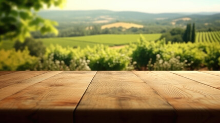 A wooden table overlooking a vineyard in the background