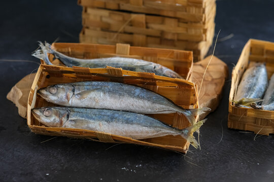 pindang fish or ikan cue in bamboo basket. Pindang is a boiling method of fish in salt and spices