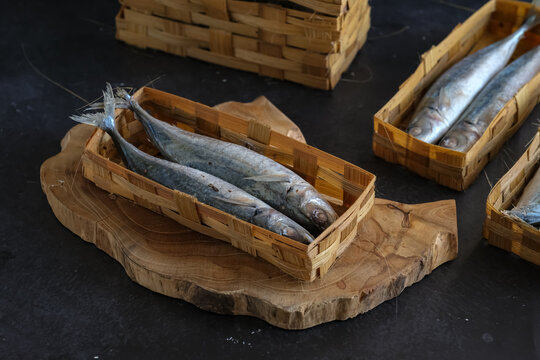 pindang fish or ikan cue in bamboo basket. Pindang is a boiling method of fish in salt and spices