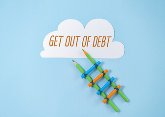 Cloud board and text notes on Create Your Own Get Out of Debt on Blue Background.