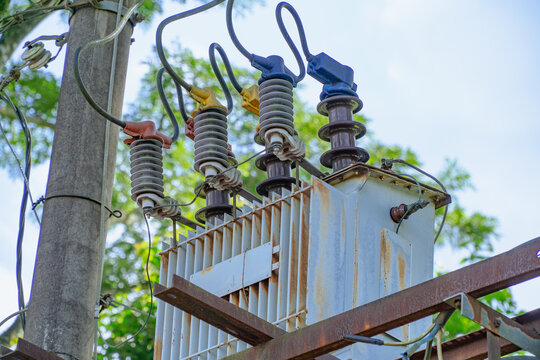 Electrical equipment. Pole-mounted distribution transformer used to provide "split-phase" power for residential and light commercial service. Distribution system (transmission) of electricity