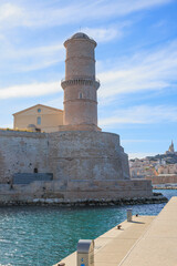 A scenics view of the tower of the Mucem (Museum of European and Mediterranean Civilisations) in Marseille, bouches-du-rh&ocirc;ne, France under a majestic blue sky and some white clouds