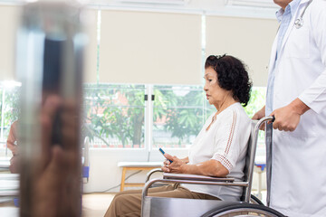 Nursing Home Care concept. A group of elderly people in nursing homes meeting with nursing care assistants