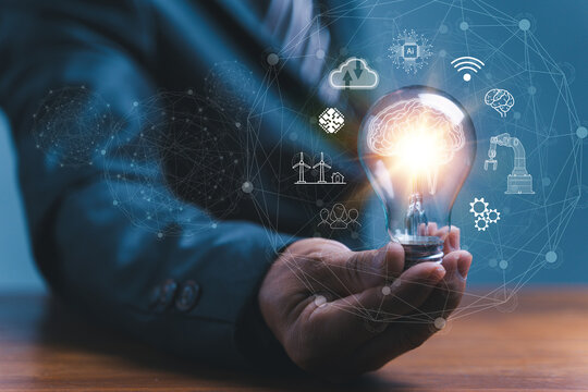 Hand holding light bulb and smart brain inside and innovation icon network connection, innovative technology in science and industrial. Creative, new ideas and innovation, Digital link tech, big data