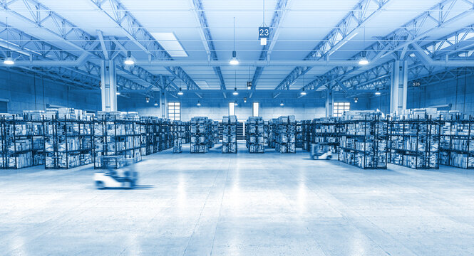 large warehouse with moving vehicle.