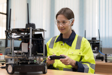 Automated manufacturing industries. Innovative technology. Female engineer inspecting quality of...