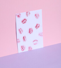 Imprints of lips kisses on a pastel background. Love letter, valentine's day. Creative layout