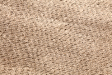 Brown Burlap texture close up. Textured fabric background