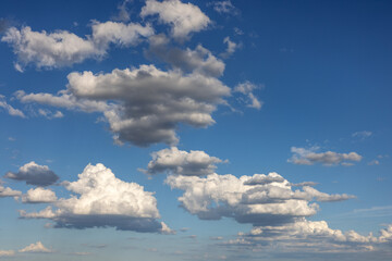 Fototapeta na wymiar Storm clouds forming against blue sky.