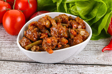 Meatball with vegetables and spices