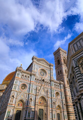 Fototapeta premium Typical urban view of Florence: the Cathedral of Santa Maria del Fiore with Giotto's Bell Tower and the Baptistery, Italy.