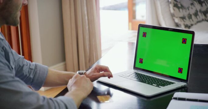 Credit card, online shopping and green screen or laptop on mock up or man with card for banking. Computer, digital payment and ecommerce or savings or banking.and guy person on pc in the living room