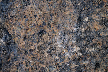 Granite surface as background. Grunge stone texture. Basalt. Rock surface background