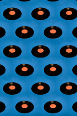 Collage of vinyl records on a blue background