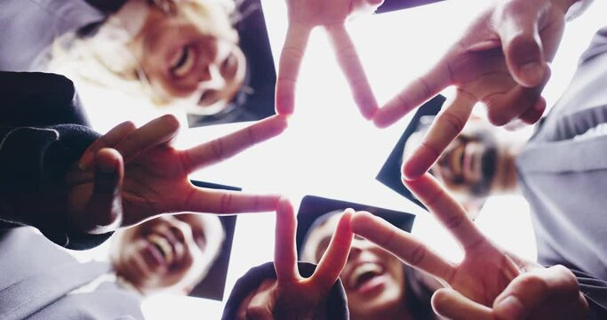 Star, hands and below university student group together for education, goal and future dream motivation. Finger, v sign and shape by college people with diversity in solidarity for academic success