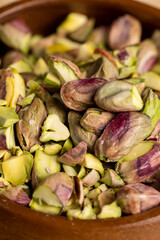 Crispy delicious pistachios with salt on the table