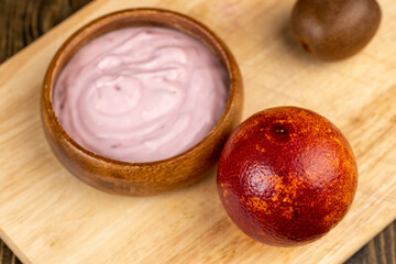 delicious red-tinged yogurt with fruit and berry flavor