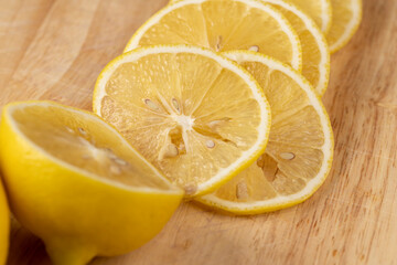 Yellow ripe lemon cut into slices