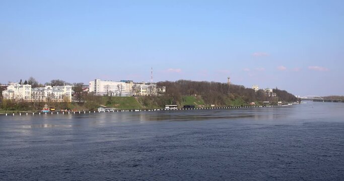 Landscape with river, forest and embankment in the city in spring.  Flood and flood of river water in spring. Rivers of Belarus. the city of Gomel. Europe.