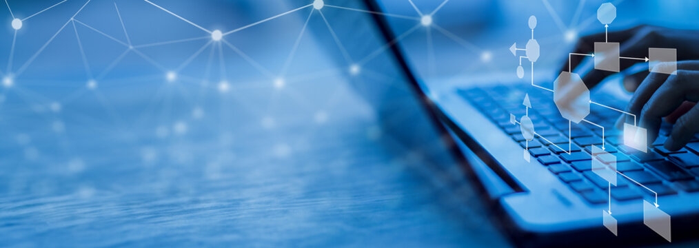 Business process and workflow automation with flowchart, businessman in background	