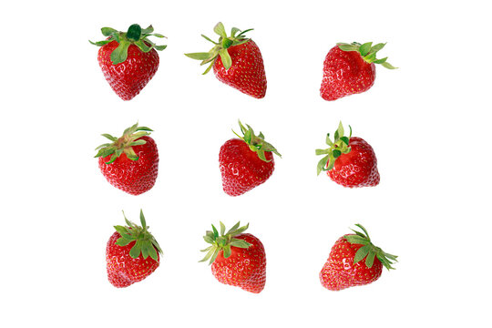 9 freigestellte frische fruchtige Erdbeeren auf weißem Hintergrund
