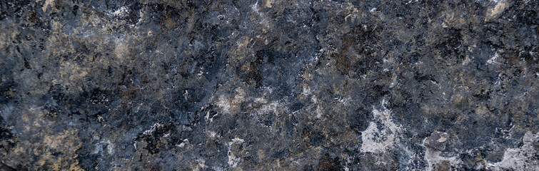 Fototapeta na wymiar Close up of granite surface. Grunge stone texture. Basalt surface background