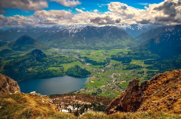 Mountain landscape in Austrian Alps. View from Loser peak over Altausseer See lake and Altausse village in Dead Mountains (Totes Gebirge) in Austria.