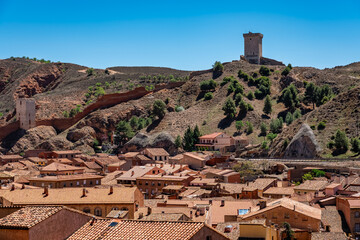 Fototapeta premium Panoramic view of the city of Daroca with its houses and its old wall surrounding the city, Zaragoza.