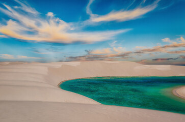 White Sand Dunes Among Lakes with Blue Water and Some Clouds in the Sky, Barreirinhas, Lencois...