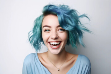 Naklejka premium Portrait of Young blue hair Woman Smiling Cheerfully and white background
