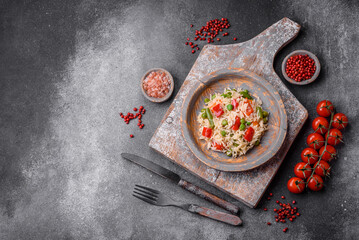 Delicious boiled rice with peppers, peas, asparagus beans and carrots