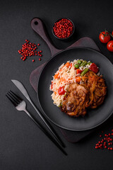 Delicious boiled rice with peppers, peas, asparagus beans and carrots and fried chicken