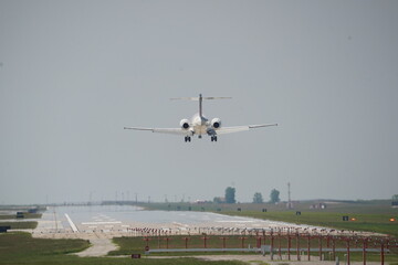 Airplane approaches runway for landing