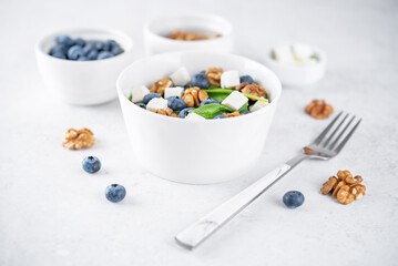 Spinach Feta blueberry salad in a bowl