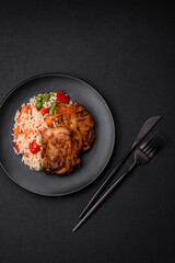 Delicious boiled rice with peppers, peas, asparagus beans and carrots and fried chicken