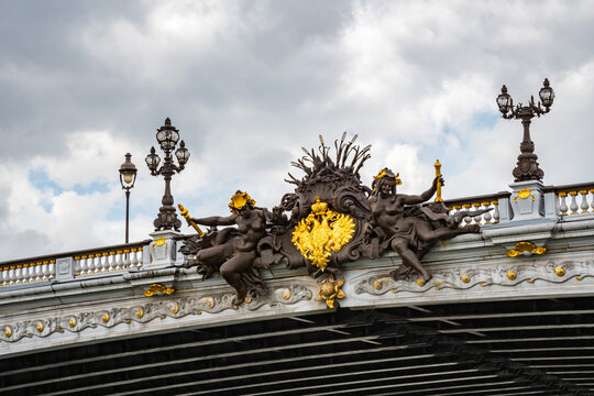 Nymphs of the Seine with the arms of Paris from the Alexandre III bridge from the Seine, in Paris, France