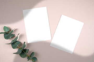 Two vertical Scandi Boho 5x7 greeting card, party invitation mockup behind on trend shadows photography.