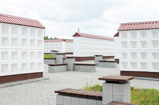 Rows of white walls for the burial of ashes after cremation. Empty boxes for urns