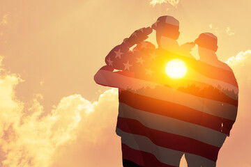 Fototapeta premium Silhouettes of soldiers with print of sunset and USA flag saluting on a background of light sky. Greeting card for Veterans Day, Memorial Day, Independence Day. America celebration.