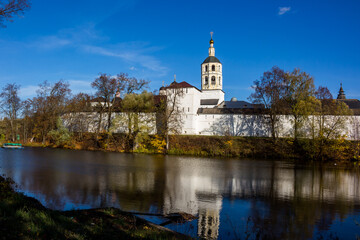 Fototapeta na wymiar View from the reservoir on the walls of the ancient Pafnutyevo-Borovsky monastery. Borovsk, Russia