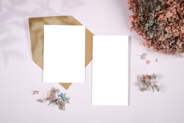 5x7 invitation card and 4x8 wedding program mockup. Boho lilac theme wedding stationery suite flatlay with shadow photography.