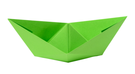 Green paper boat on a white isolated background